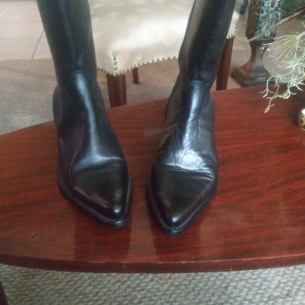 Steve Madden black Western style boots.